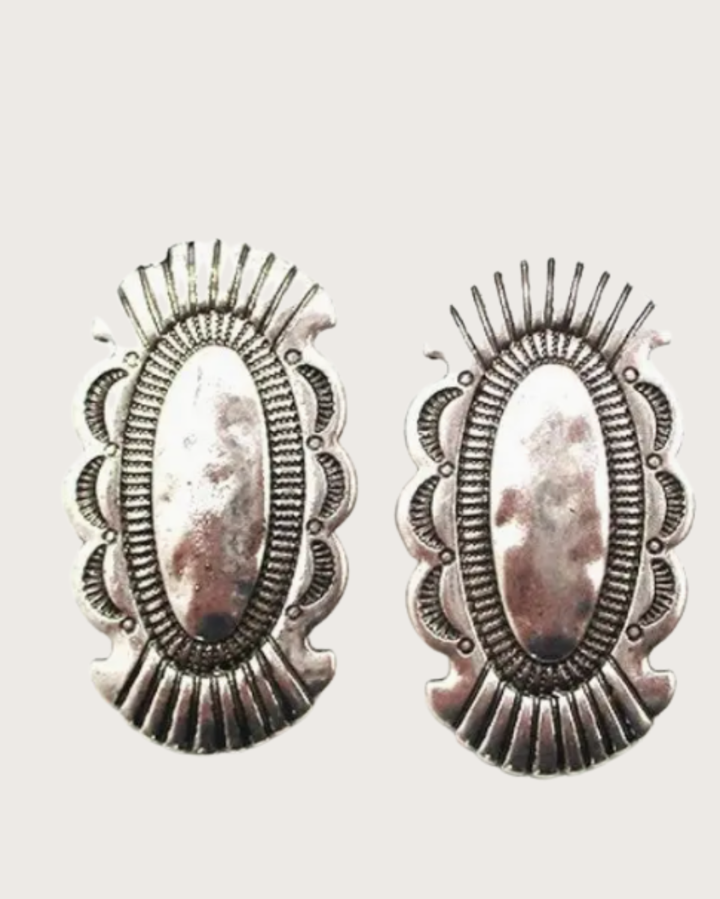 The Silver Spur Concho Earrings
